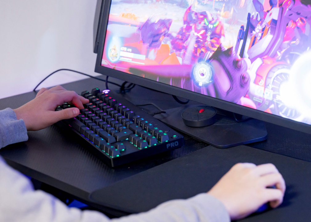 A person playing a video game on a desktop computer